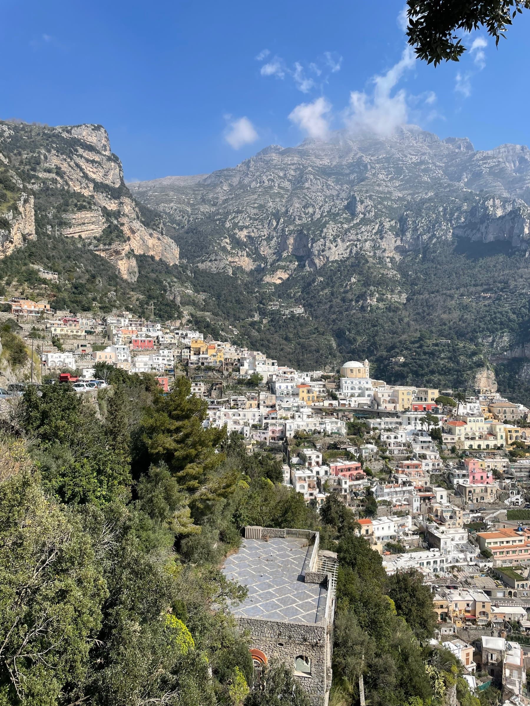 Pastel cliffside village above the sea in Positano, Italy